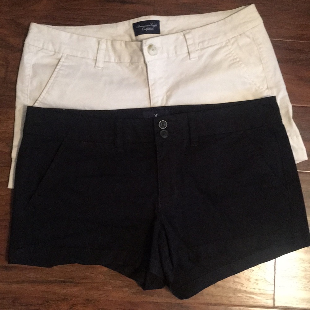 cream and black shorts